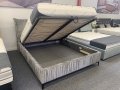 Łóżko SIMONE ONE tapicerowane light z miękkim zagłówkiem oraz pojemnikiem na pościel / schowkiem  - Bed Design w Świat Sypialni Piaseczno rozmiary 140/200; 160/200 ; 180/200 ; 200/200 ; 140x/200 ; 160x200 ; 180x200 ; 200x200