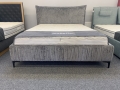 Łóżko SIMONE ONE tapicerowane light z miękkim zagłówkiem oraz pojemnikiem na pościel / schowkiem  - Bed Design w Świat Sypialni Piaseczno rozmiary 140/200; 160/200 ; 180/200 ; 200/200 ; 140x/200 ; 160x200 ; 180x200 ; 200x200