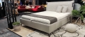 Łóżko SIMONE ONE tapicerowane light z miękkim zagłówkiem oraz pojemnikiem na pościel / schowkiem  - Bed Design w Świat Sypialni Piaseczno rozmiary 140/200; 160/200 ; 180/200 ; 200/200 ; 140x/200 ; 160x200 ; 180x200 ; 200x200