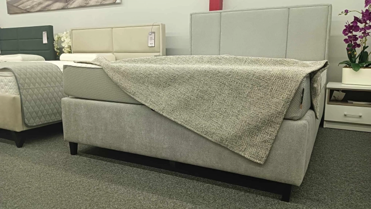 Łóżko kontynentalne CRISTIANO Easy Kontynent z pojemnikiem na pościel - Bed Design, obicie TopTextil Hevia 207.16 kolor szary, w Świat Sypialni Piaseczno
