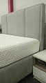 Łóżko kontynentalne CRISTIANO Easy Kontynent z pojemnikiem na pościel - Bed Design, obicie TopTextil Hevia 207.16 kolor szary, w Świat Sypialni Piaseczno
